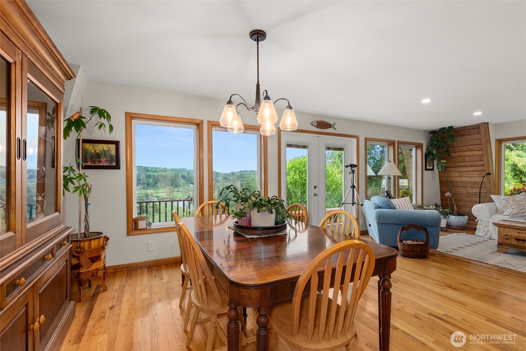 1508 Bloomhardt Road Raymond, WA 98577 - Photo 18 of 40 a view of a dining room with furniture window and wooden floor