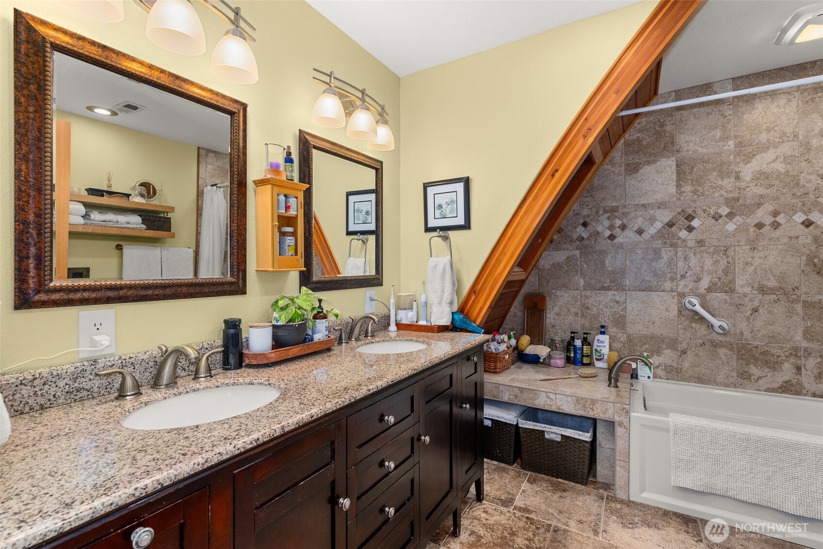 1508 Bloomhardt Road Raymond, WA 98577 - Photo 26 of 40 a bathroom with a granite countertop sink and a mirror