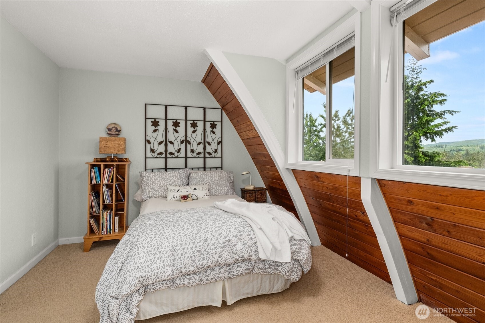 1508 Bloomhardt Road Raymond, WA 98577 - Photo 29 of 40 a bedroom with a bed and a large window