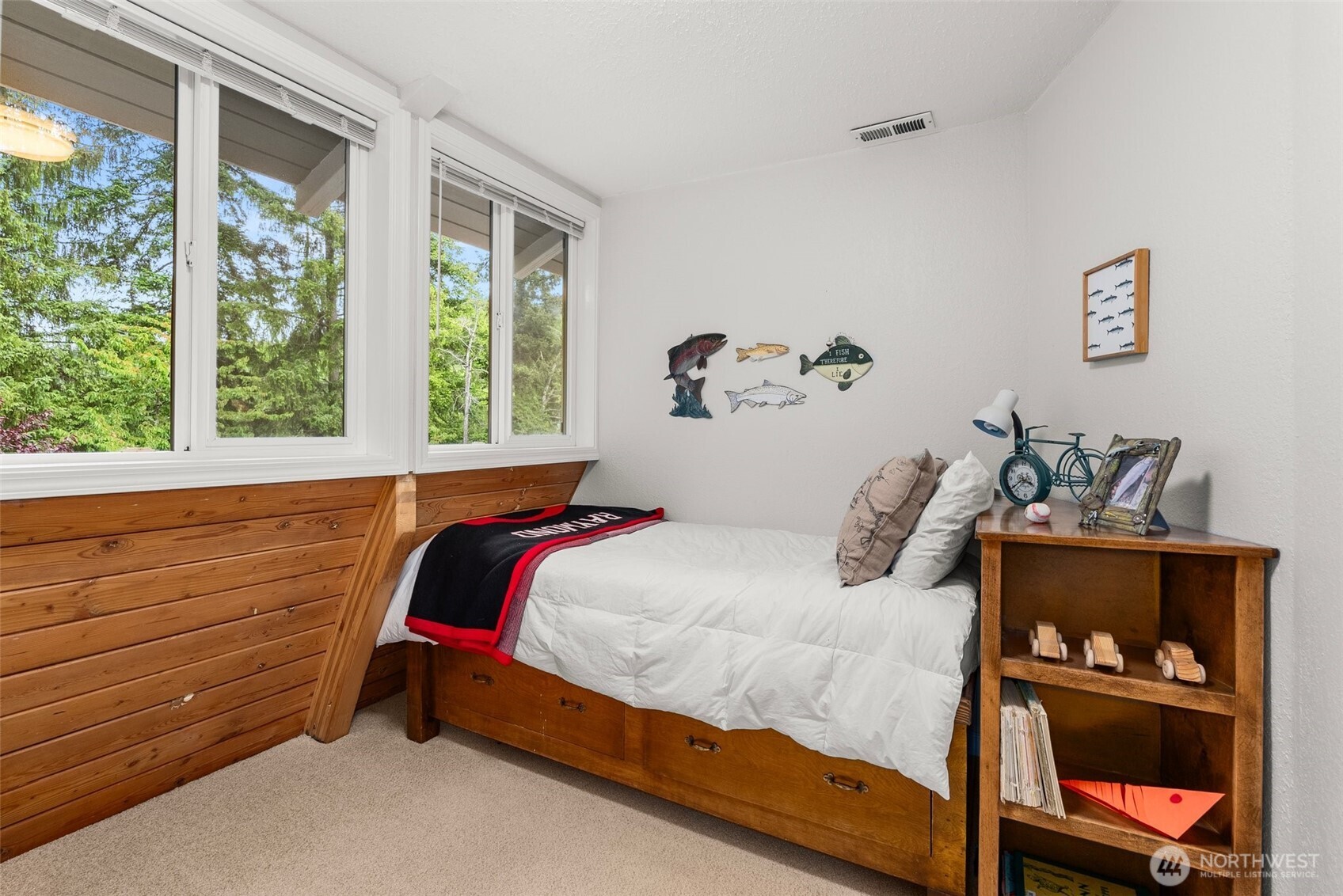 1508 Bloomhardt Road Raymond, WA 98577 - Photo 30 of 40 a bedroom with a bed and window