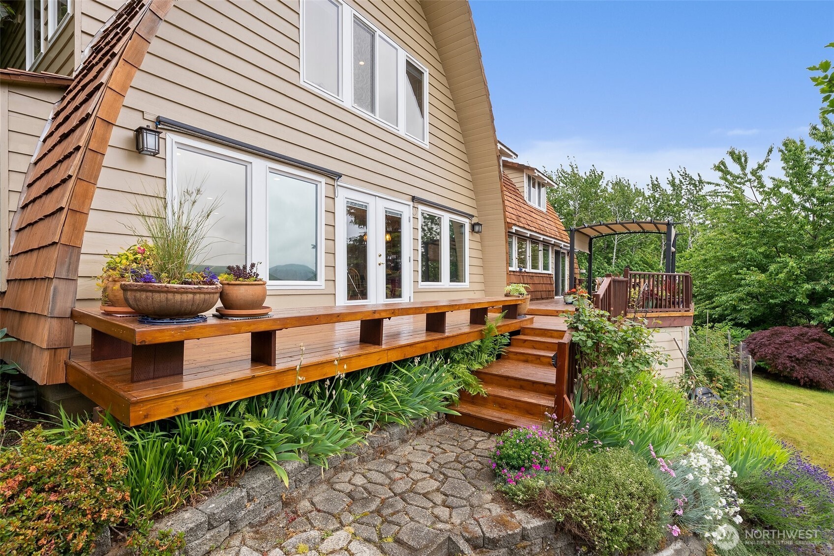 1508 Bloomhardt Road Raymond, WA 98577 - Photo 32 of 40 a front view of a house with garden and sitting area