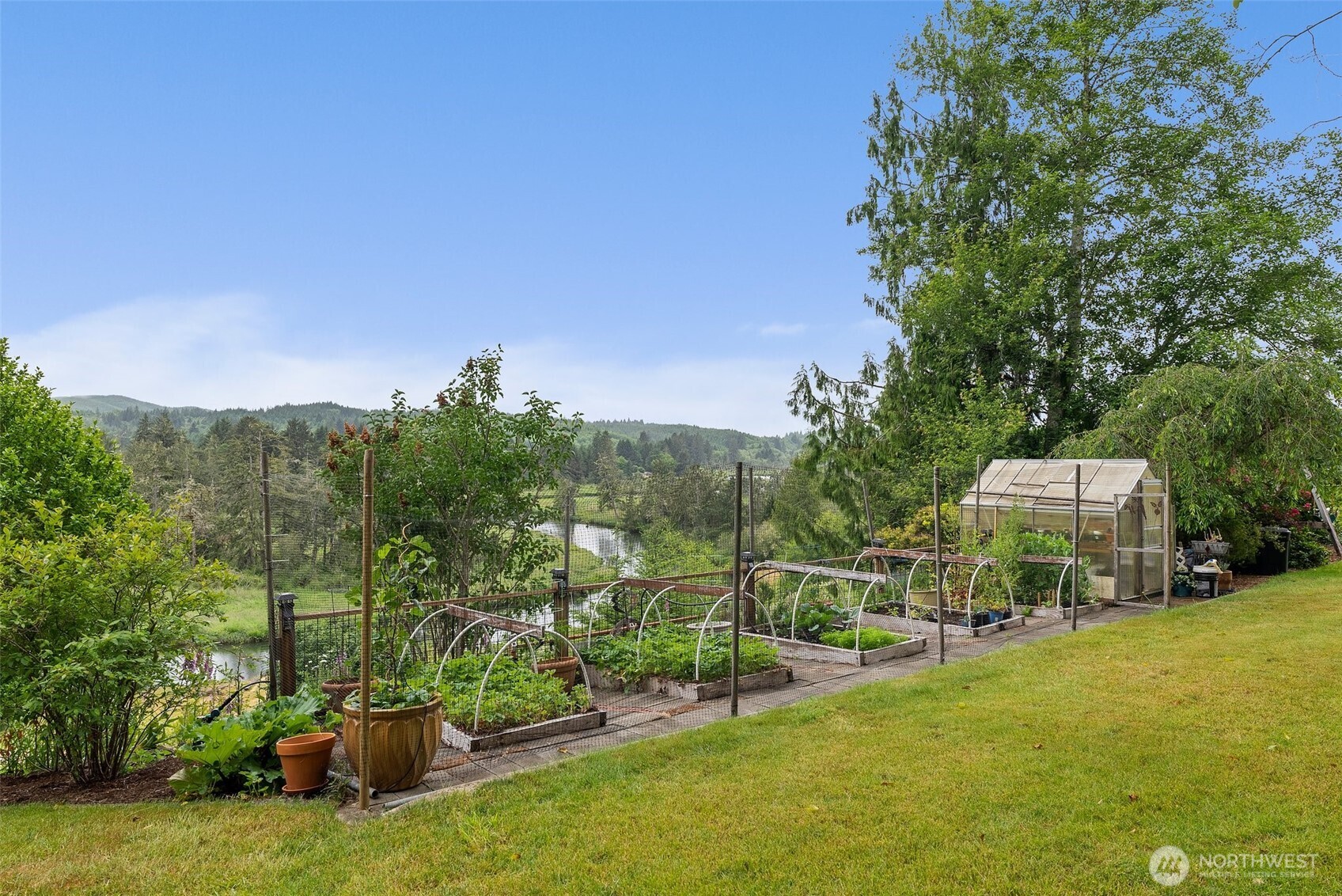 1508 Bloomhardt Road Raymond, WA 98577 - Photo 36 of 40 a view of a garden with houses