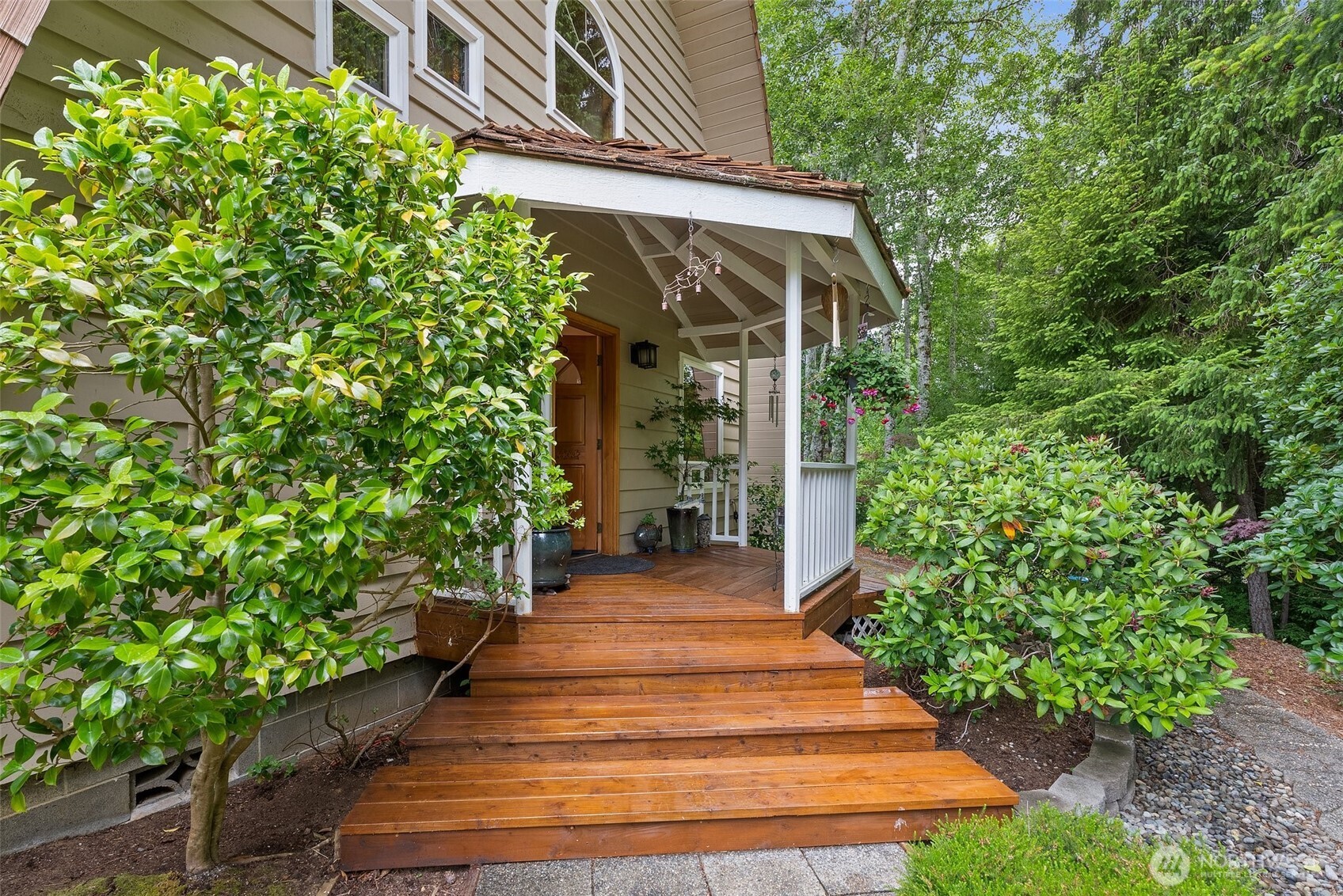 1508 Bloomhardt Road Raymond, WA 98577 - Photo 7 of 40 a view of a pathway of a house with potted plants