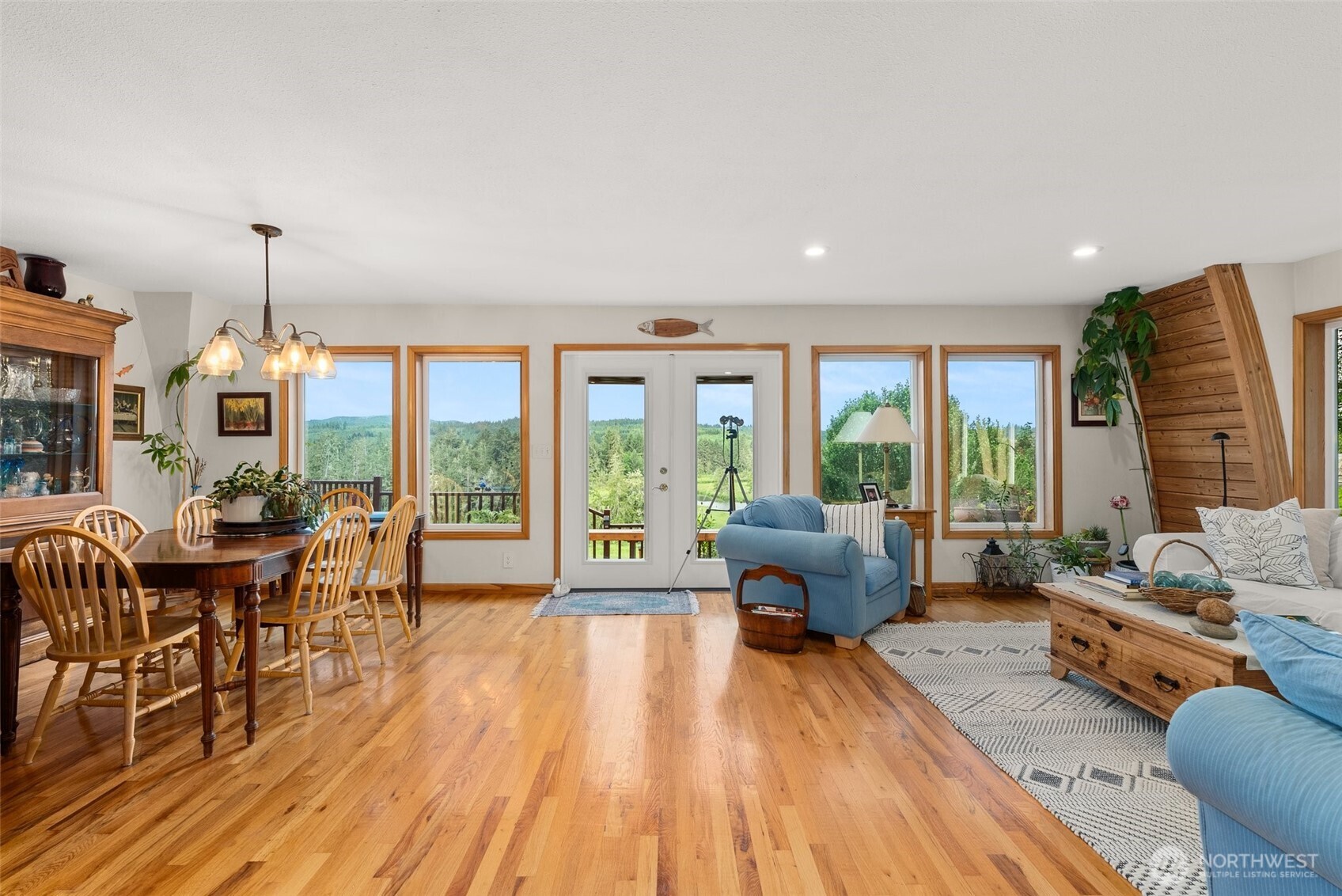 1508 Bloomhardt Road Raymond, WA 98577 - Photo 8 of 40 a living room with furniture and large windows