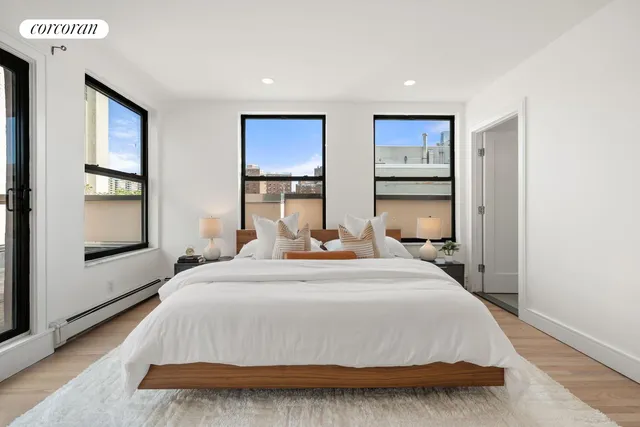 a bathroom with a sink toilet and mirror
