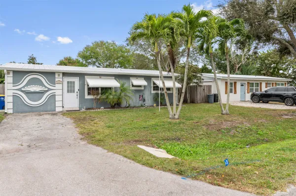 $335,000 | 5709 Southeast Indigo Avenue, Stuart, FL 34997