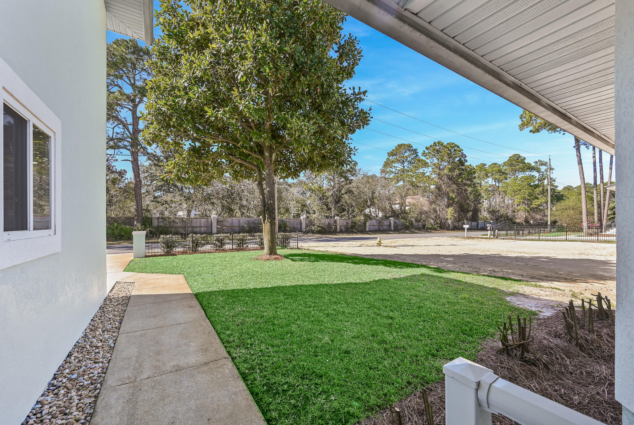 292 West Harborview Road Santa Rosa Beach, FL 32459 - Photo 19 of 43 a view of backyard with green space