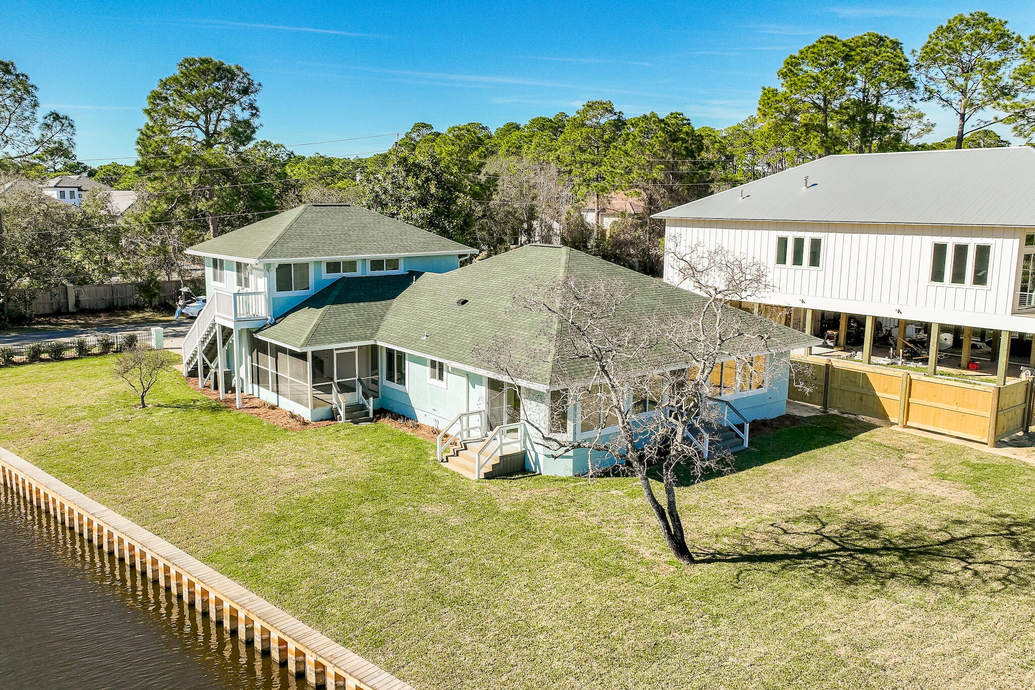 292 West Harborview Road Santa Rosa Beach, FL 32459 - Photo 37 of 43 an aerial view of a house having yard patio and swimming pool