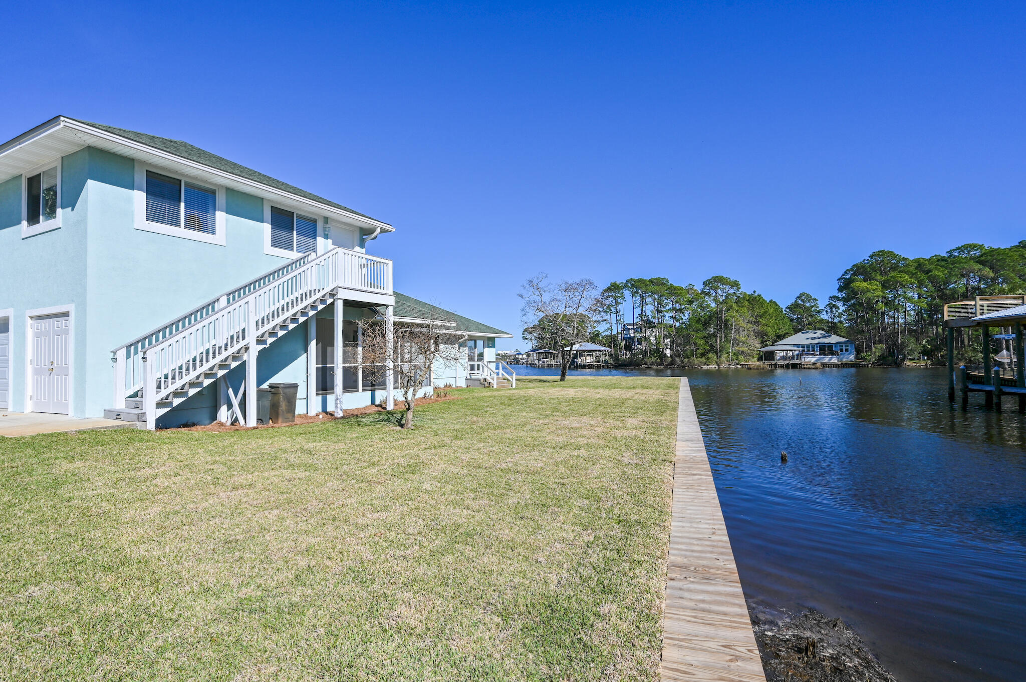 292 West Harborview Road Santa Rosa Beach, FL 32459 - Photo 43 of 43 a view of a house with yard and lake view
