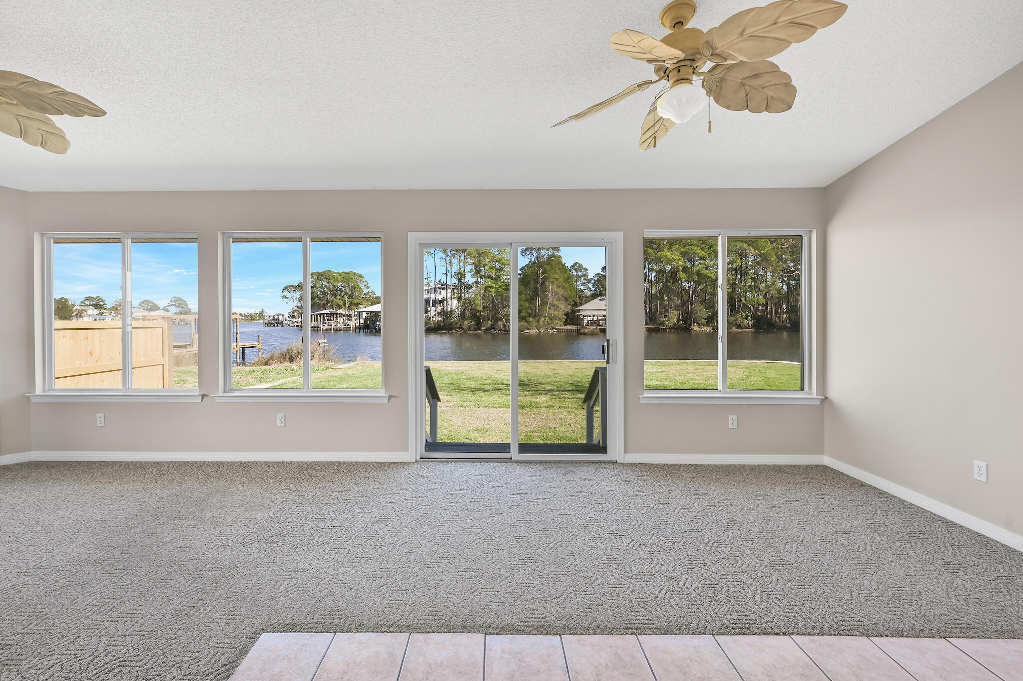 292 West Harborview Road Santa Rosa Beach, FL 32459 - Photo 6 of 43 a view of an empty room with a window
