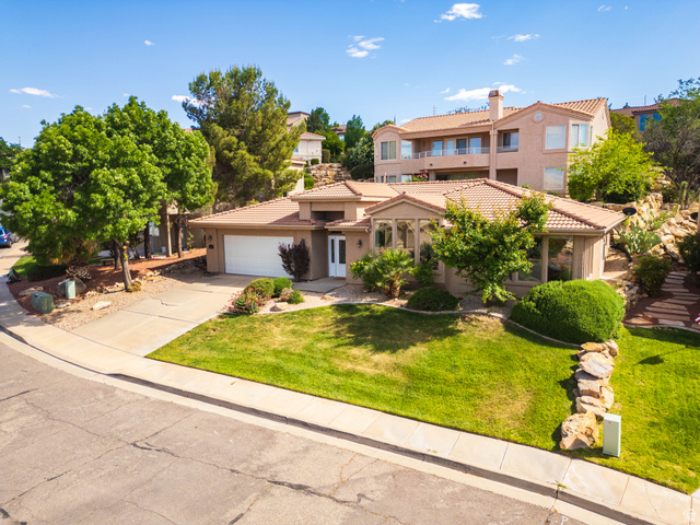 2158 Balboa Way St. George, UT 84770 - Photo 34 of 40 Stucco exterior with a terracotta tile roof