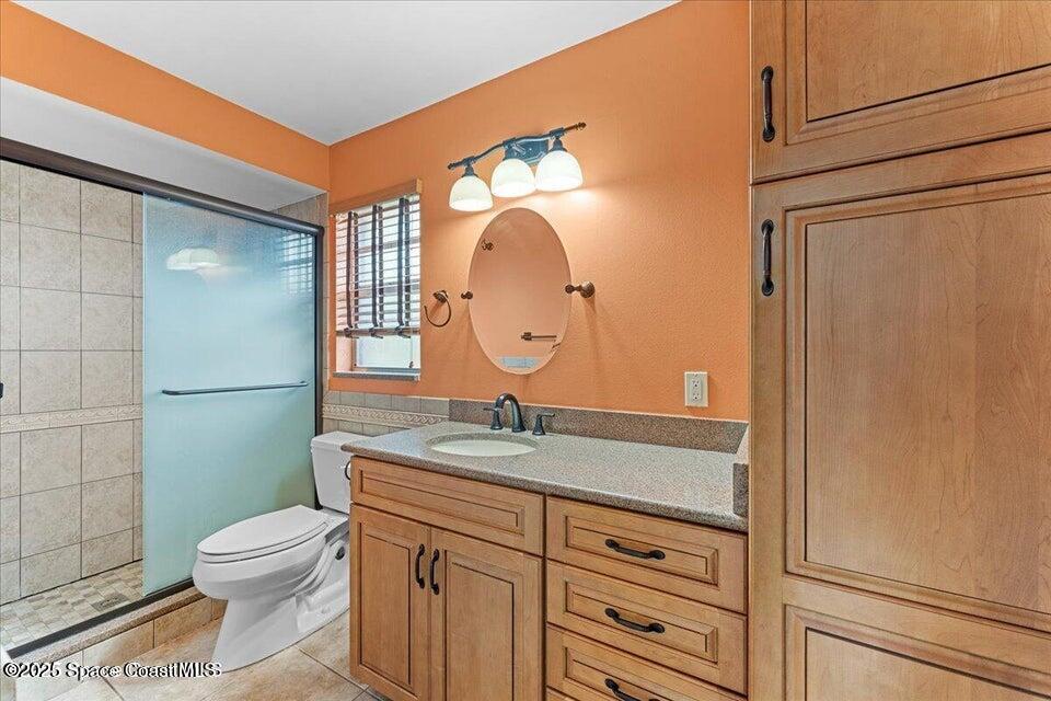 1527 Spruce Road Melbourne, FL 32935 - Photo 6 of 24 master bedroom bathroom