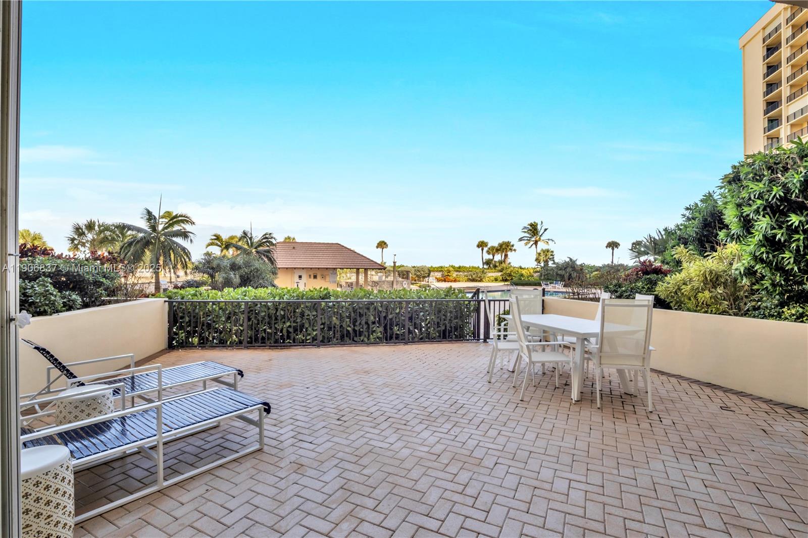 300 Ocean Trail Way, Unit 108 Jupiter, FL 33477 - Photo 15 of 21 a view of a terrace with furniture and city view