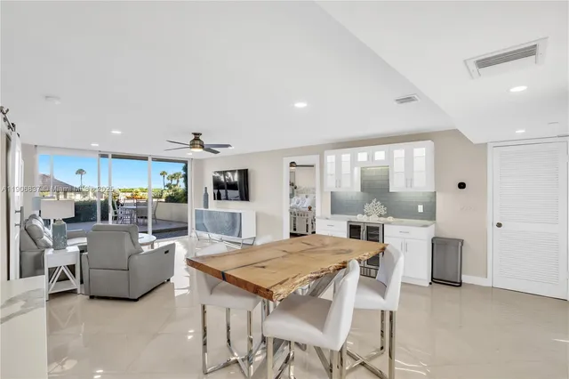 a view of a dining room with furniture