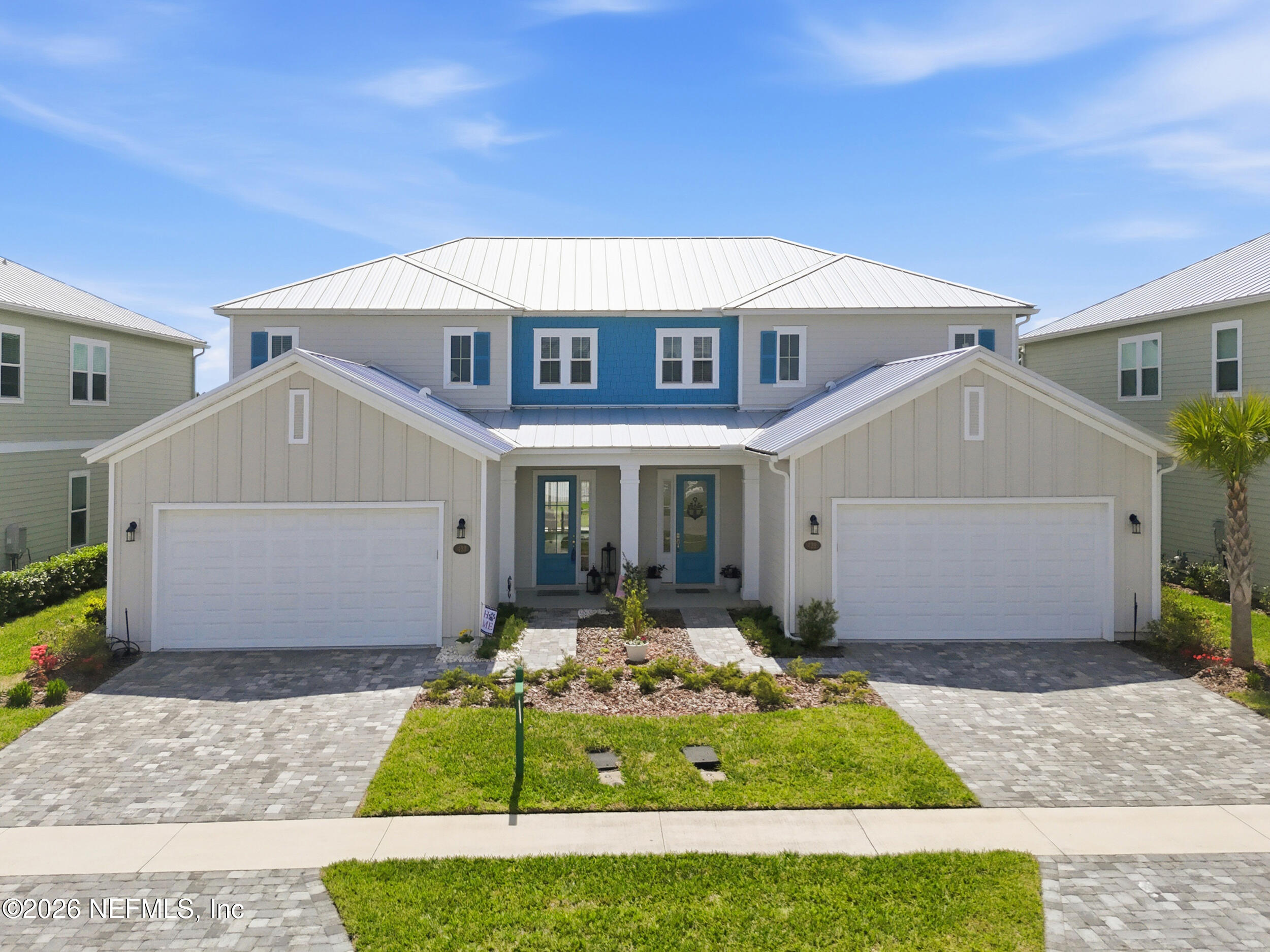 439 Rum Runner Way St. Johns, FL 32259 - Photo 1 of 82 a front view of a house with garden
