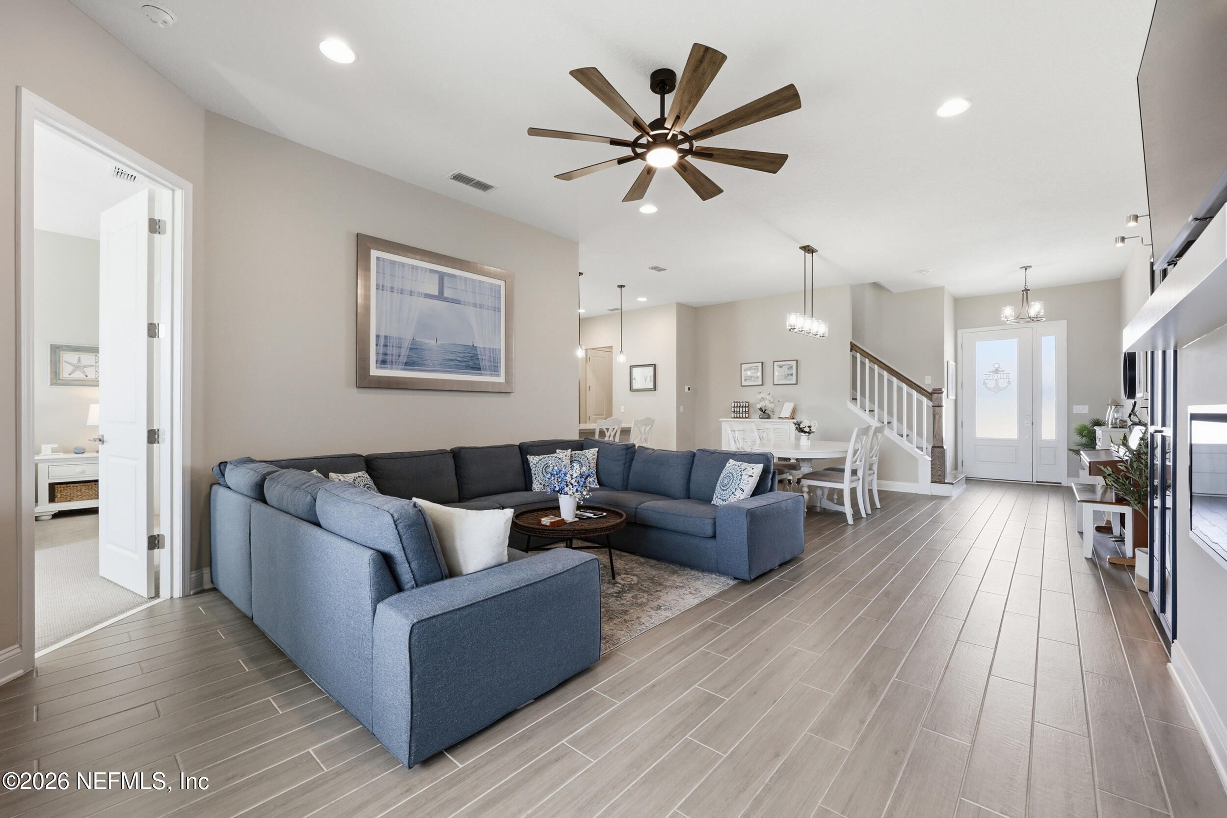 439 Rum Runner Way St. Johns, FL 32259 - Photo 12 of 82 a living room with furniture and wooden floor