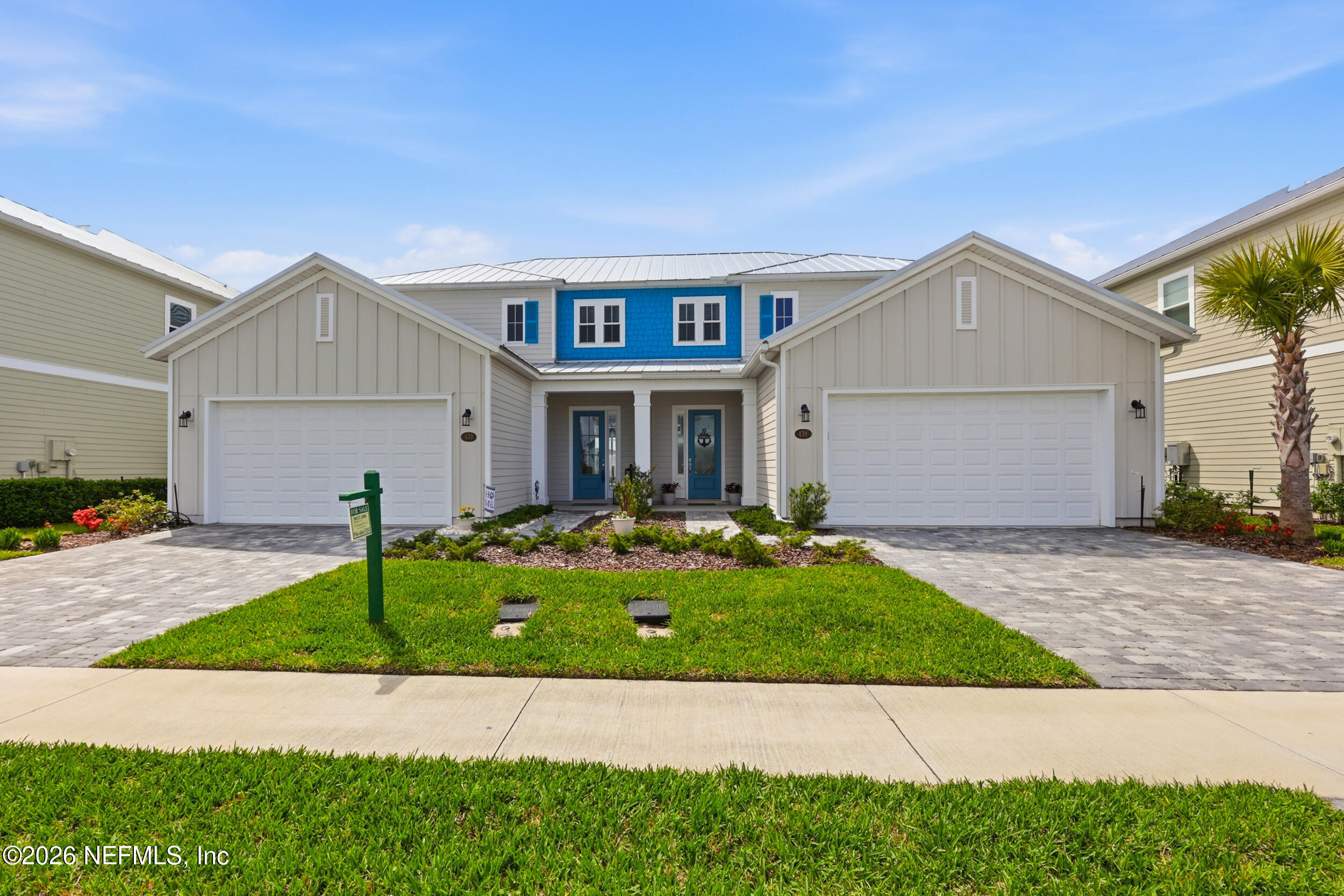 439 Rum Runner Way St. Johns, FL 32259 - Photo 2 of 82 a front view of a house with a yard and garage