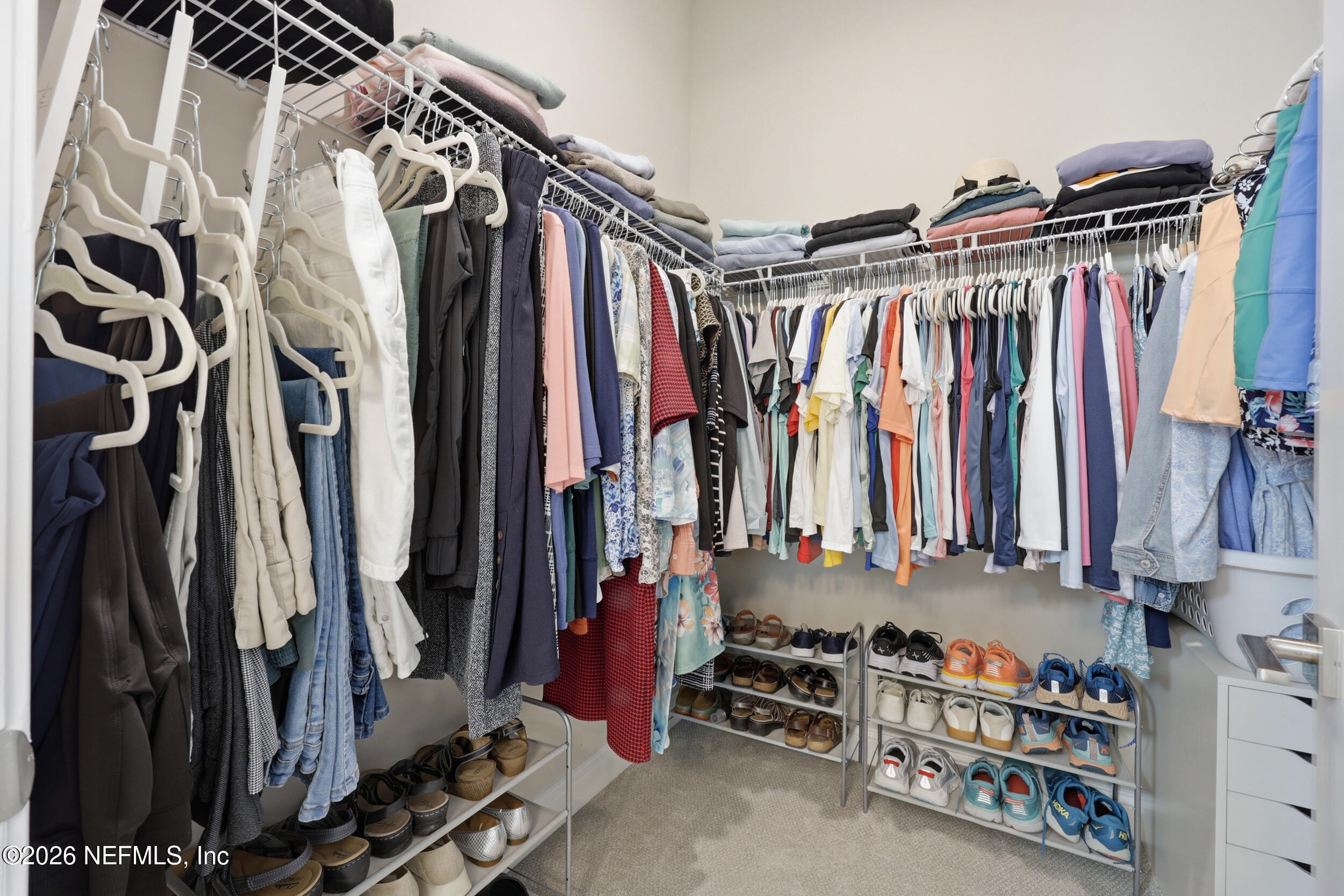 439 Rum Runner Way St. Johns, FL 32259 - Photo 28 of 82 a view of walk in closet with clothes and shoes