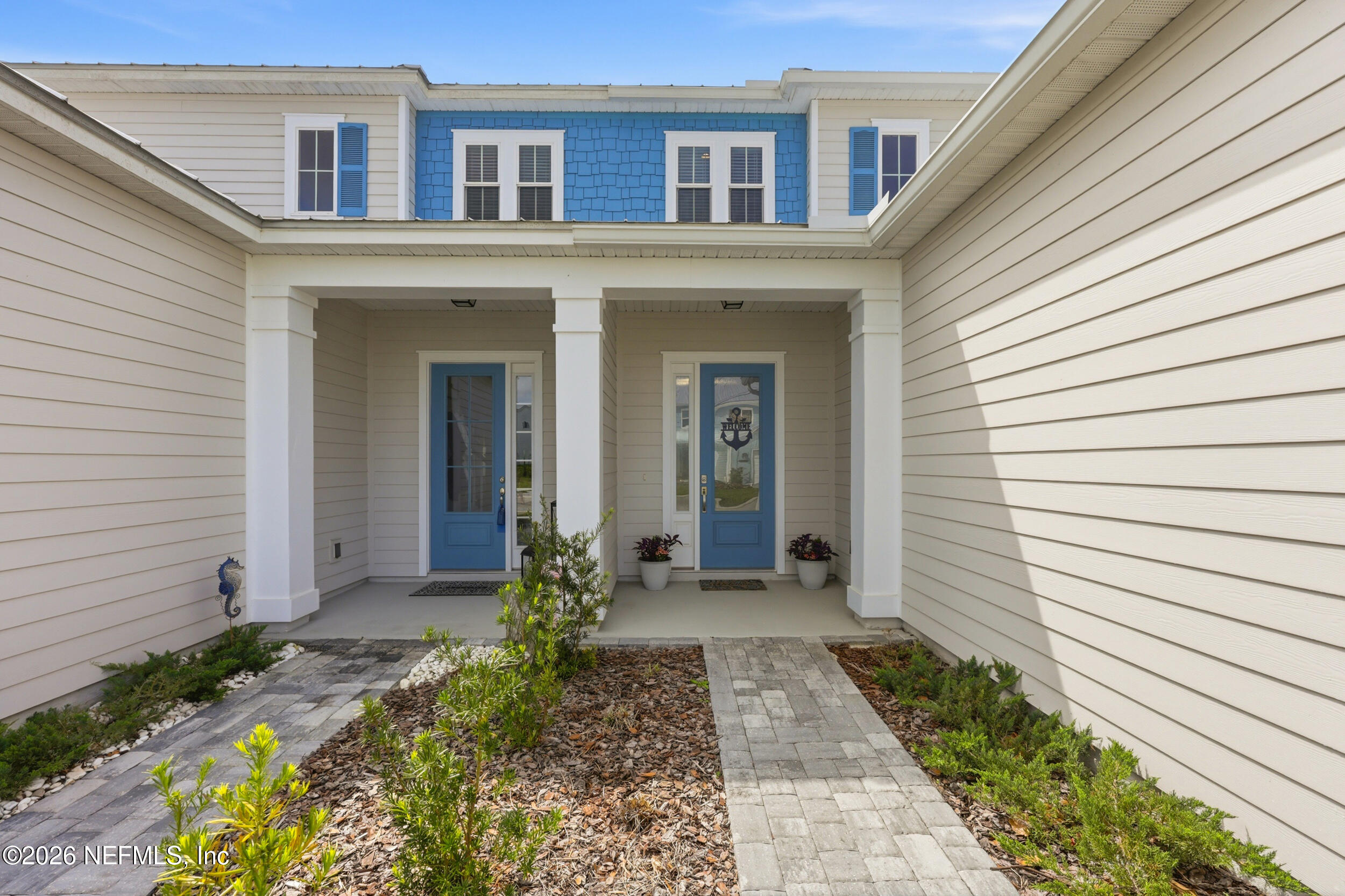 439 Rum Runner Way St. Johns, FL 32259 - Photo 3 of 82 a front view of a house with a yard