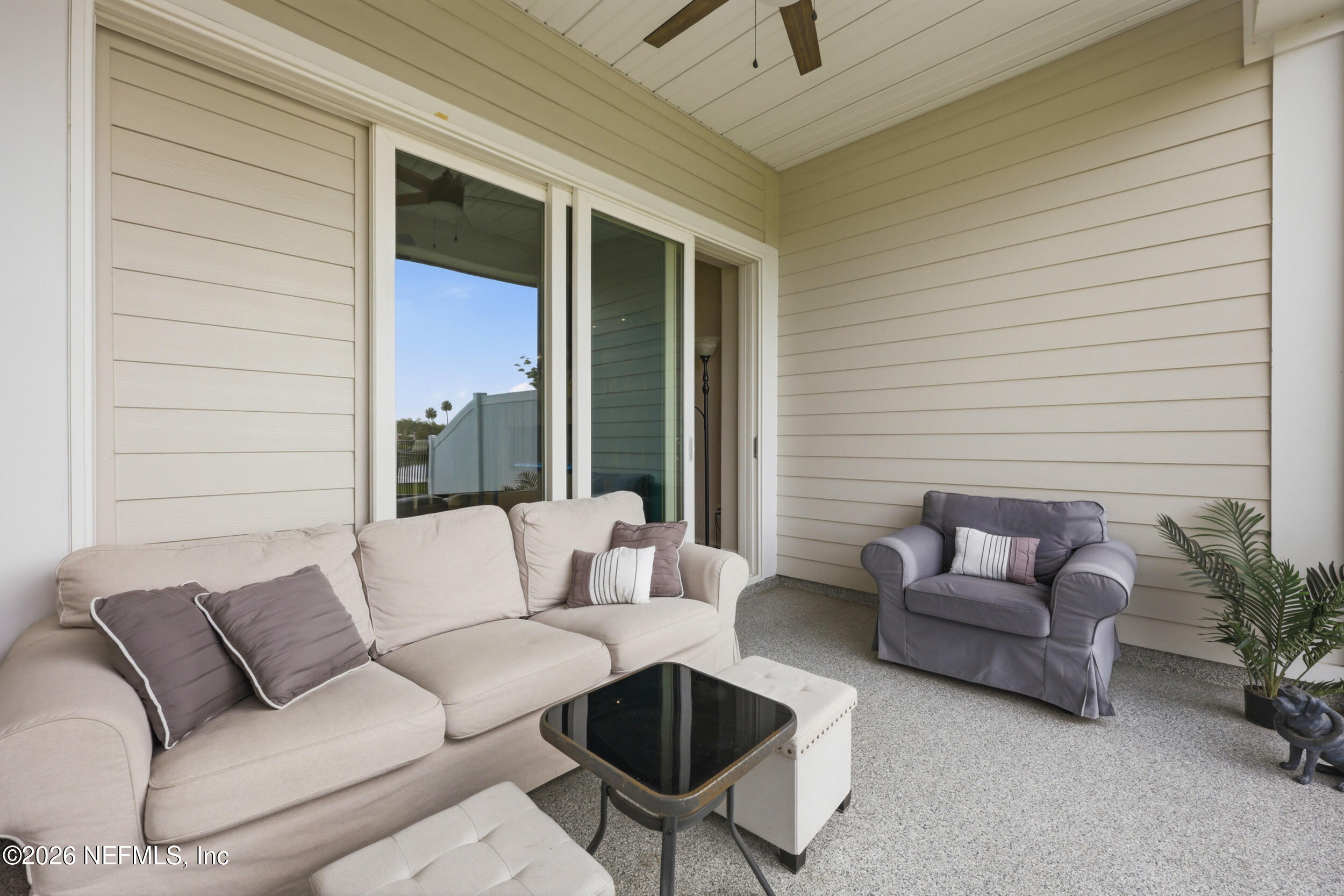 439 Rum Runner Way St. Johns, FL 32259 - Photo 45 of 82 a outdoor living space with furniture and a potted plant