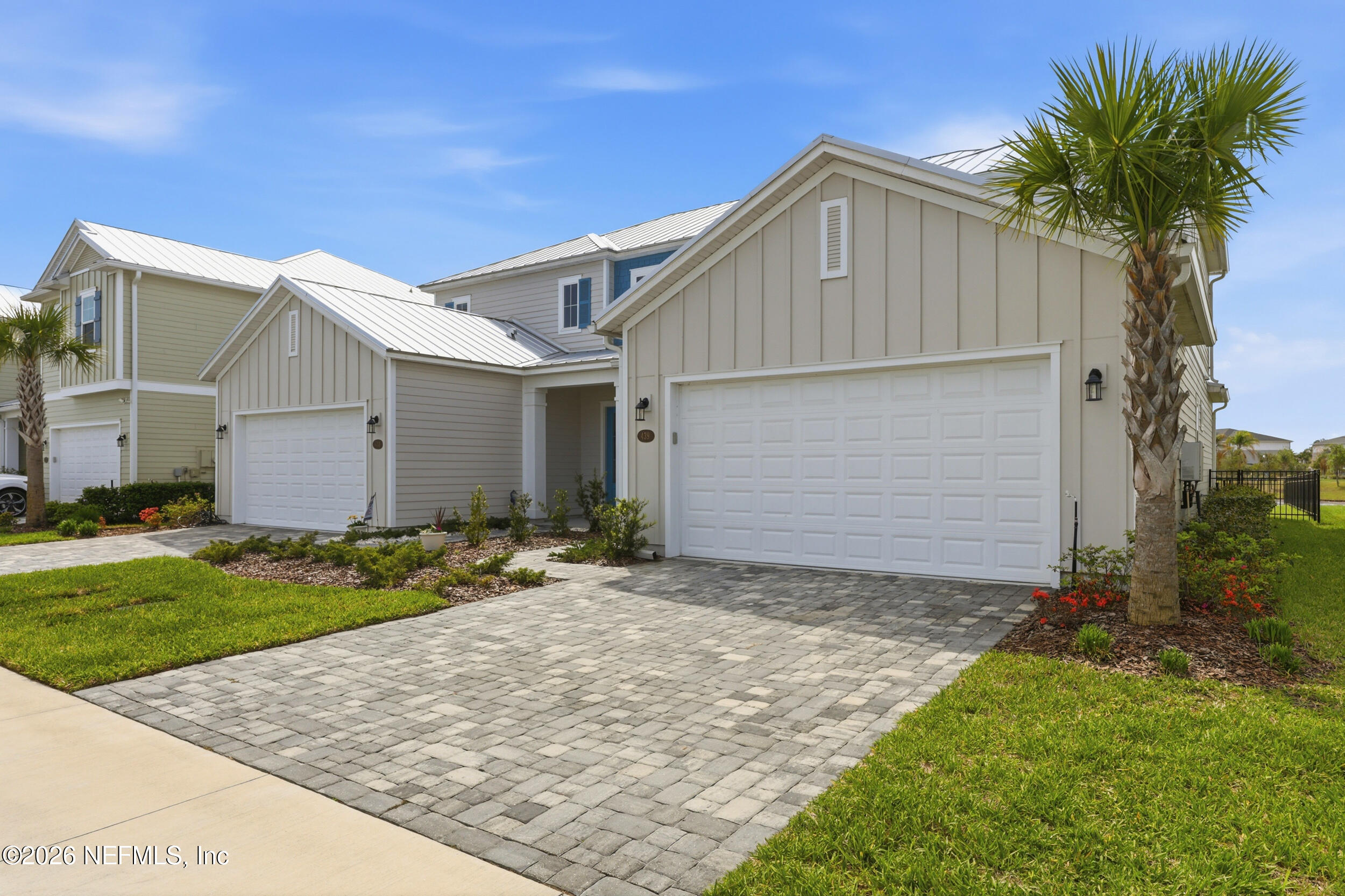 439 Rum Runner Way St. Johns, FL 32259 - Photo 55 of 82 a front view of house with yard and trees around