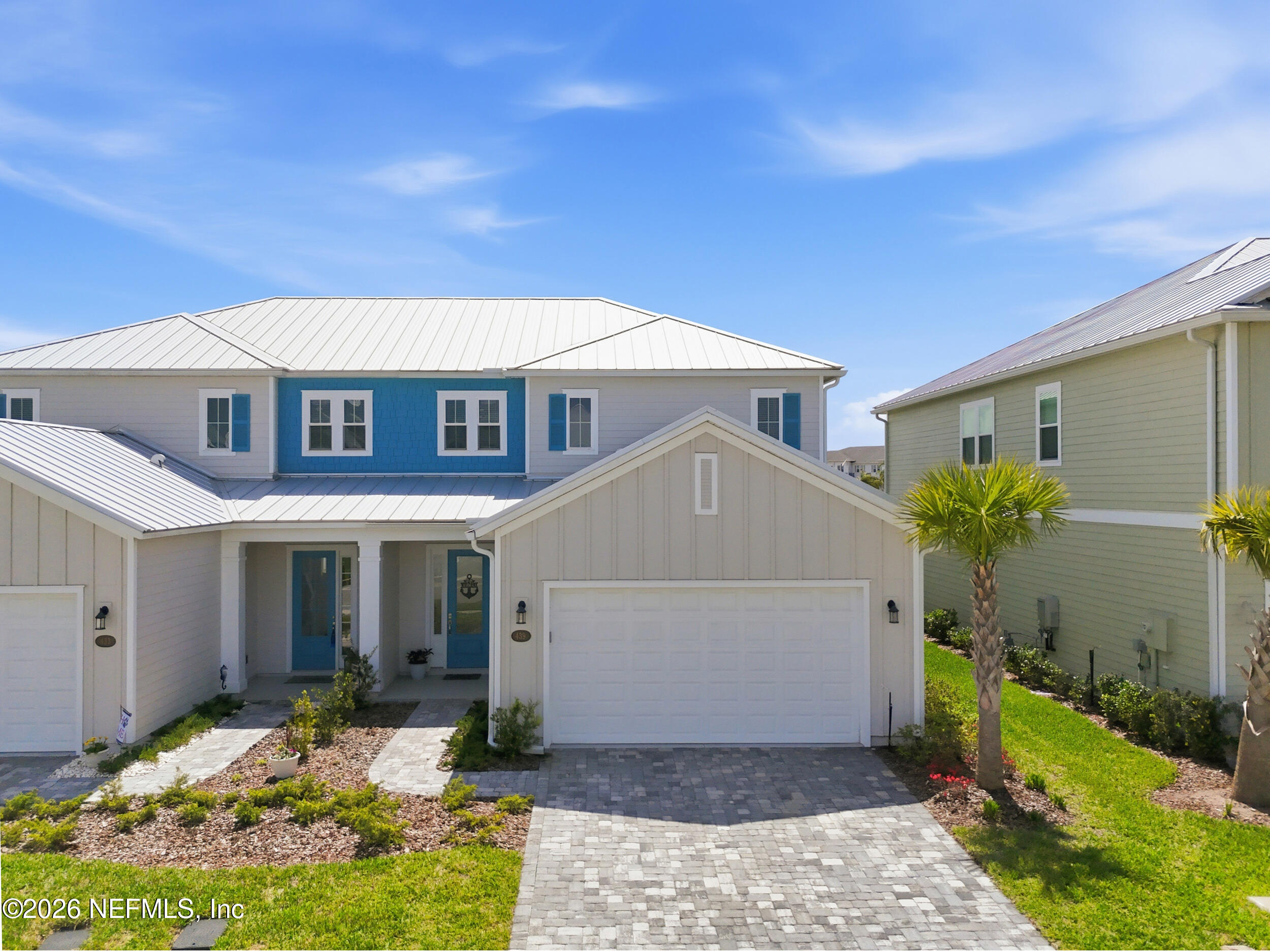 439 Rum Runner Way St. Johns, FL 32259 - Photo 57 of 82 a front view of a house with a yard