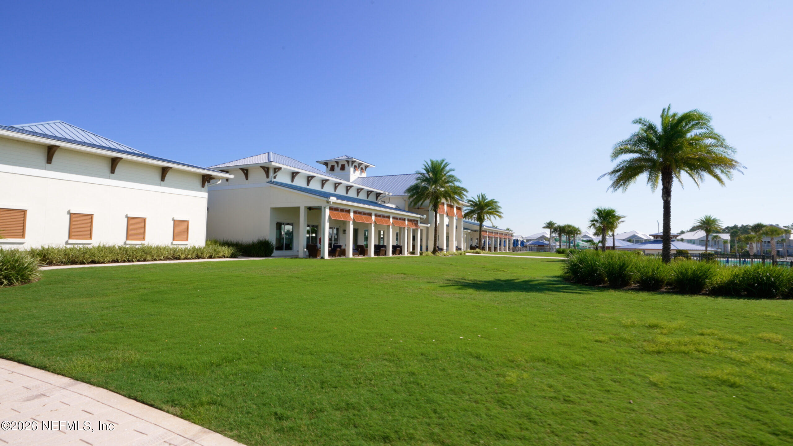439 Rum Runner Way St. Johns, FL 32259 - Photo 70 of 82 a front view of a house with a garden and yard