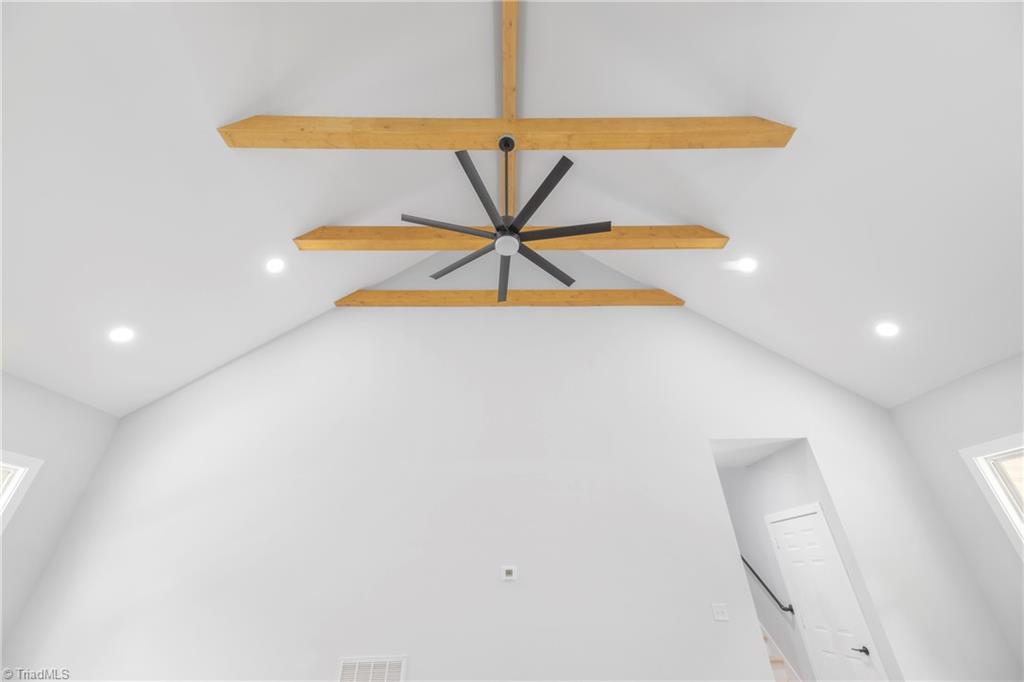 475 Timber Ridge Road Kernersville, NC 27284 - Photo 16 of 43 The high ceiling makes the downstairs living areas look even larger!