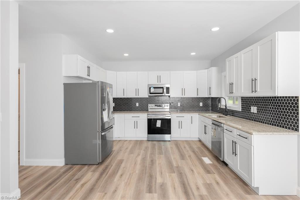 475 Timber Ridge Road Kernersville, NC 27284 - Photo 17 of 43 Kitchen...all new stainless steel appliances.