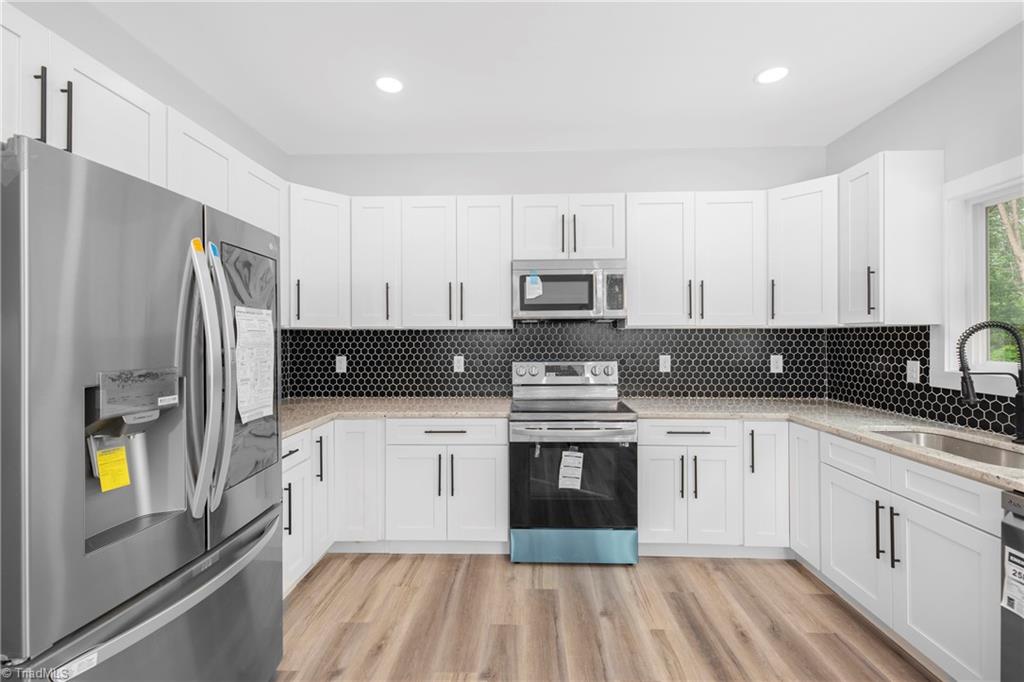 475 Timber Ridge Road Kernersville, NC 27284 - Photo 20 of 43 Soooo many cabinets...beautiful!