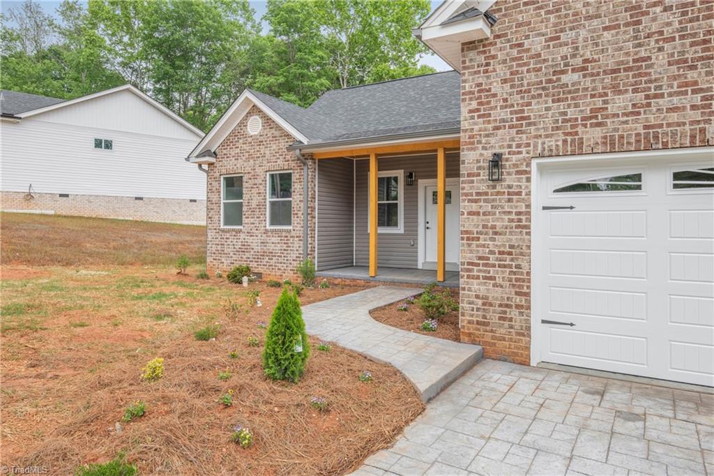 475 Timber Ridge Road Kernersville, NC 27284 - Photo 2 of 43 New construction home with new homes on each side.