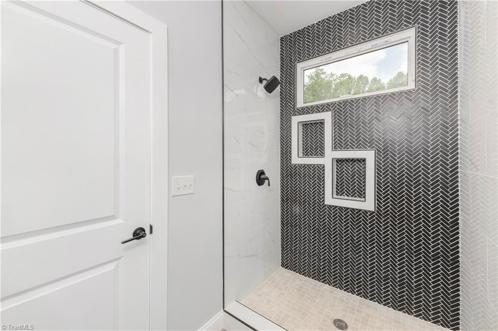 475 Timber Ridge Road Kernersville, NC 27284 - Photo 27 of 43 Primary bedroom ensuite bathroom.