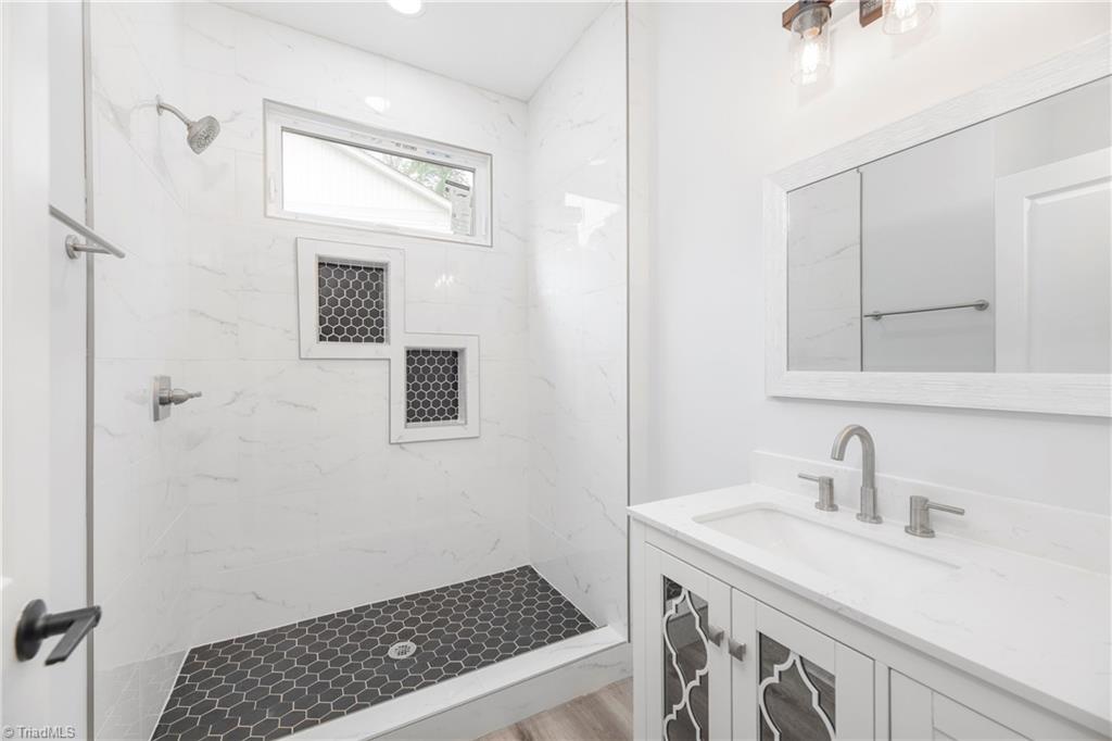 475 Timber Ridge Road Kernersville, NC 27284 - Photo 30 of 43 Additional full bathroom on main.