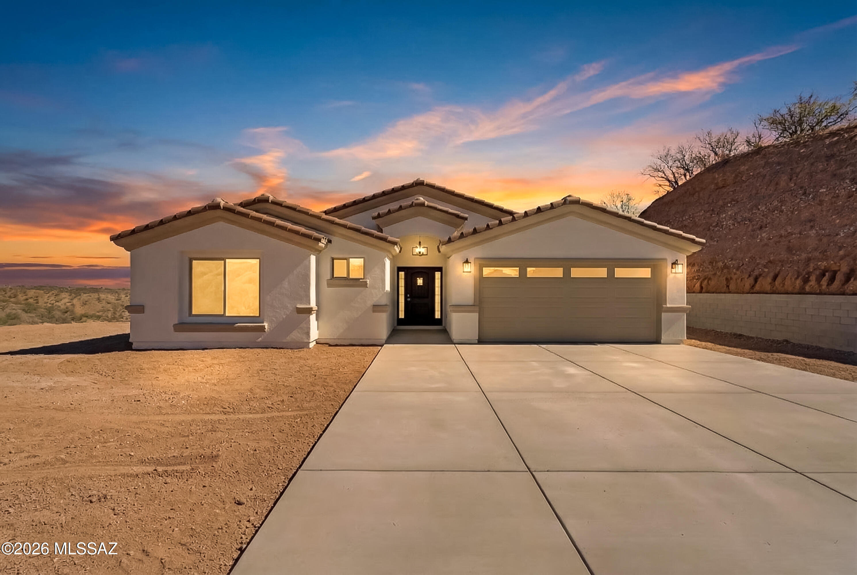 979 Calle Amarillo Rio Rico, AZ 85648 - Photo 1 of 47 0 Front Sunset-1
