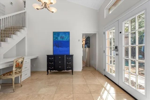 a room with furniture and a window