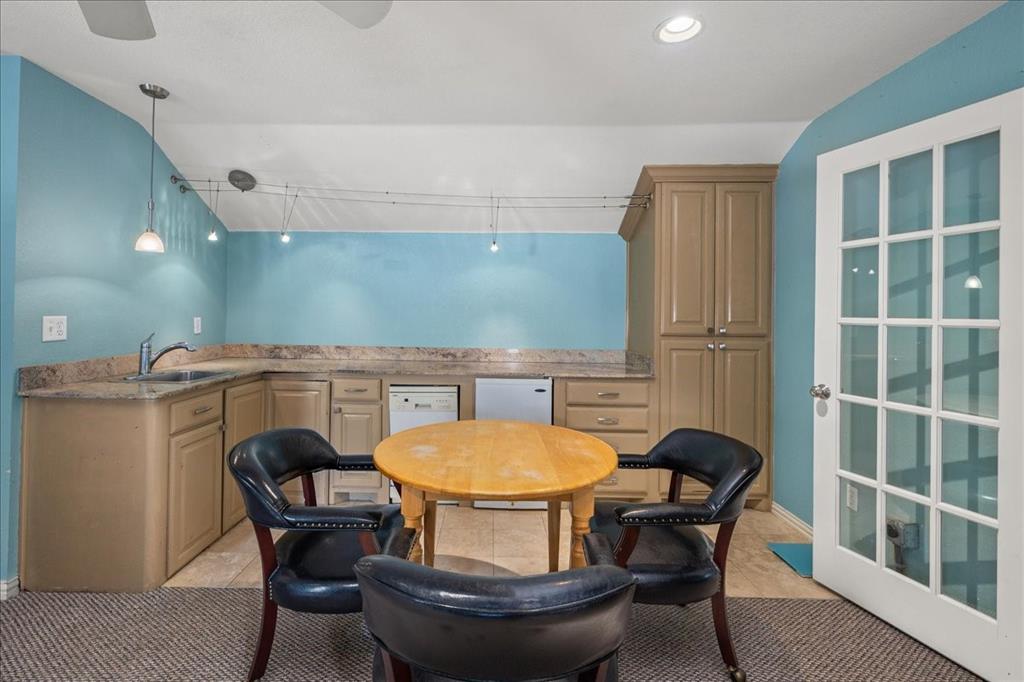 1929 Berkeley Place Fort Worth, TX 76110 - Photo 33 of 34 a view of a dining room with furniture and wooden floor