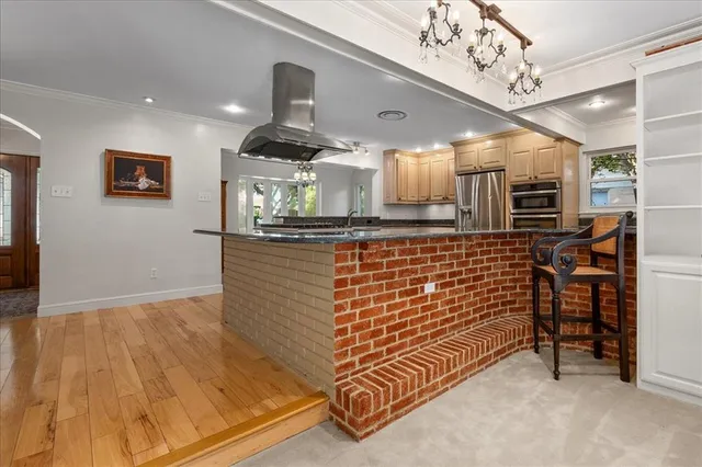 a view of a hallway with stairs