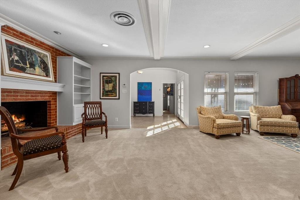 1929 Berkeley Place Fort Worth, TX 76110 - Photo 9 of 34 a living room with furniture and a fireplace