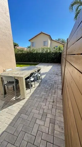 a view of a terrace with sitting area