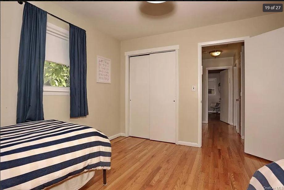 6 Schevchenko Place Spring Valley, NY 10977 - Photo 15 of 21 a view of a room with wooden floor and a window