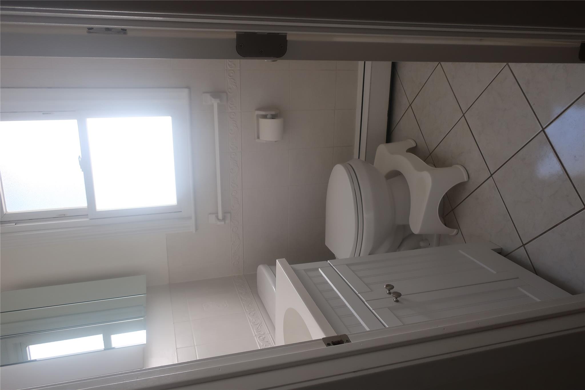 6 Schevchenko Place Spring Valley, NY 10977 - Photo 20 of 21 a bathroom with a toilet and a sink