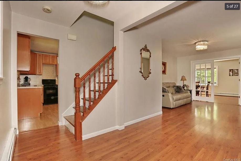 6 Schevchenko Place Spring Valley, NY 10977 - Photo 5 of 21 a view of a living room and a wooden floor