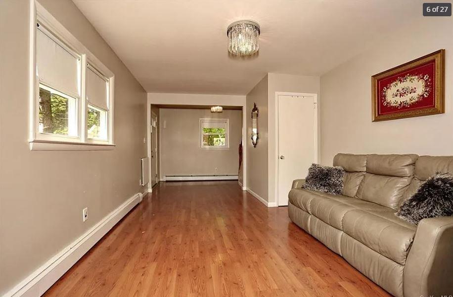 6 Schevchenko Place Spring Valley, NY 10977 - Photo 6 of 21 a living room with furniture and a wooden floor
