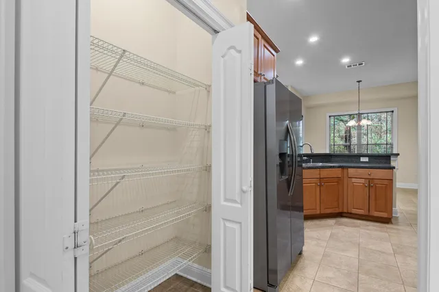 a bathroom with a shower and a sink