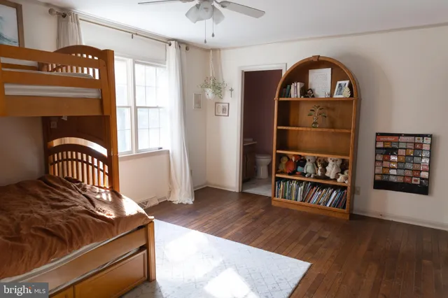 a view of front door with wooden floor