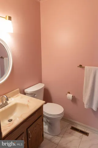 a view of kitchen island with wooden floor