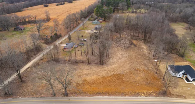 a view of stairs and small yard