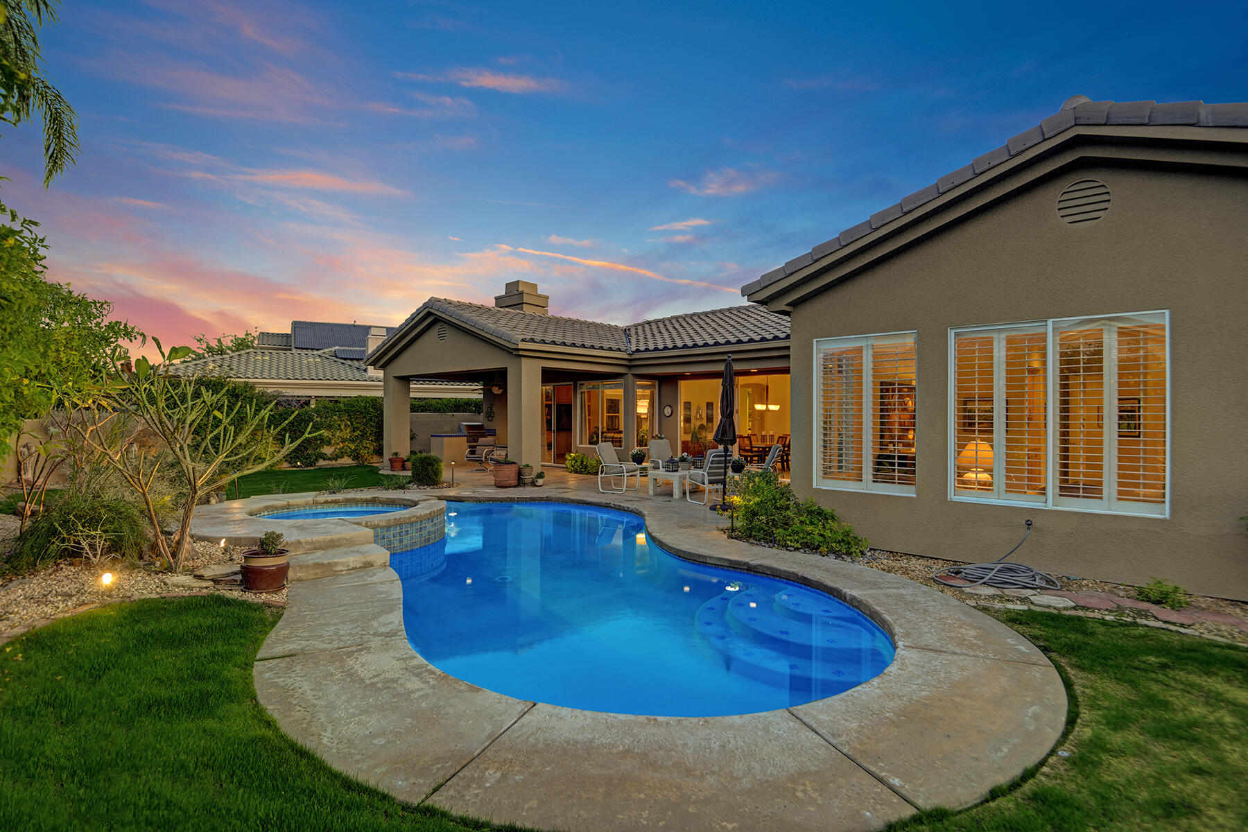26 Scarborough Way Rancho Mirage, CA 92270 - Photo 55 of 65 POOL AND SPA TO HOUSE NIGHT MLS