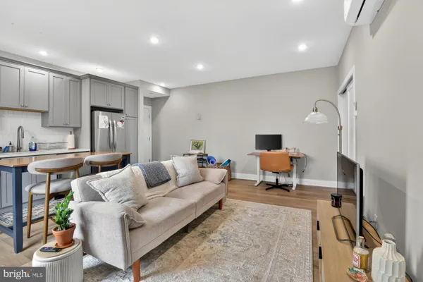 a living room with furniture and a couch