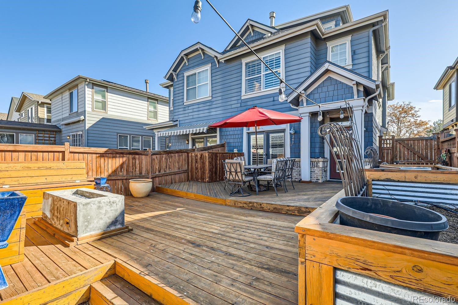 1145 South Logan Street Denver, CO 80210 - Photo 21 of 21 a view of a house with pool and chairs